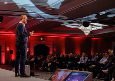 CEO giving keynote speech at corporate conference in Hotel Arts Barcelona